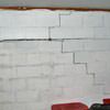 A buckling foundation wall in a  home.
