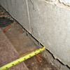 Foundation wall separating from the floor in  home