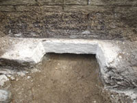 Preparing a foundation footing for helical pier installation in Kauai