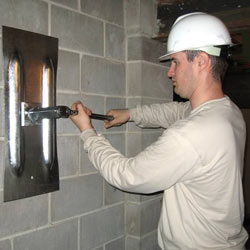 installing a wall anchor to repair an bowing foundation wall in 